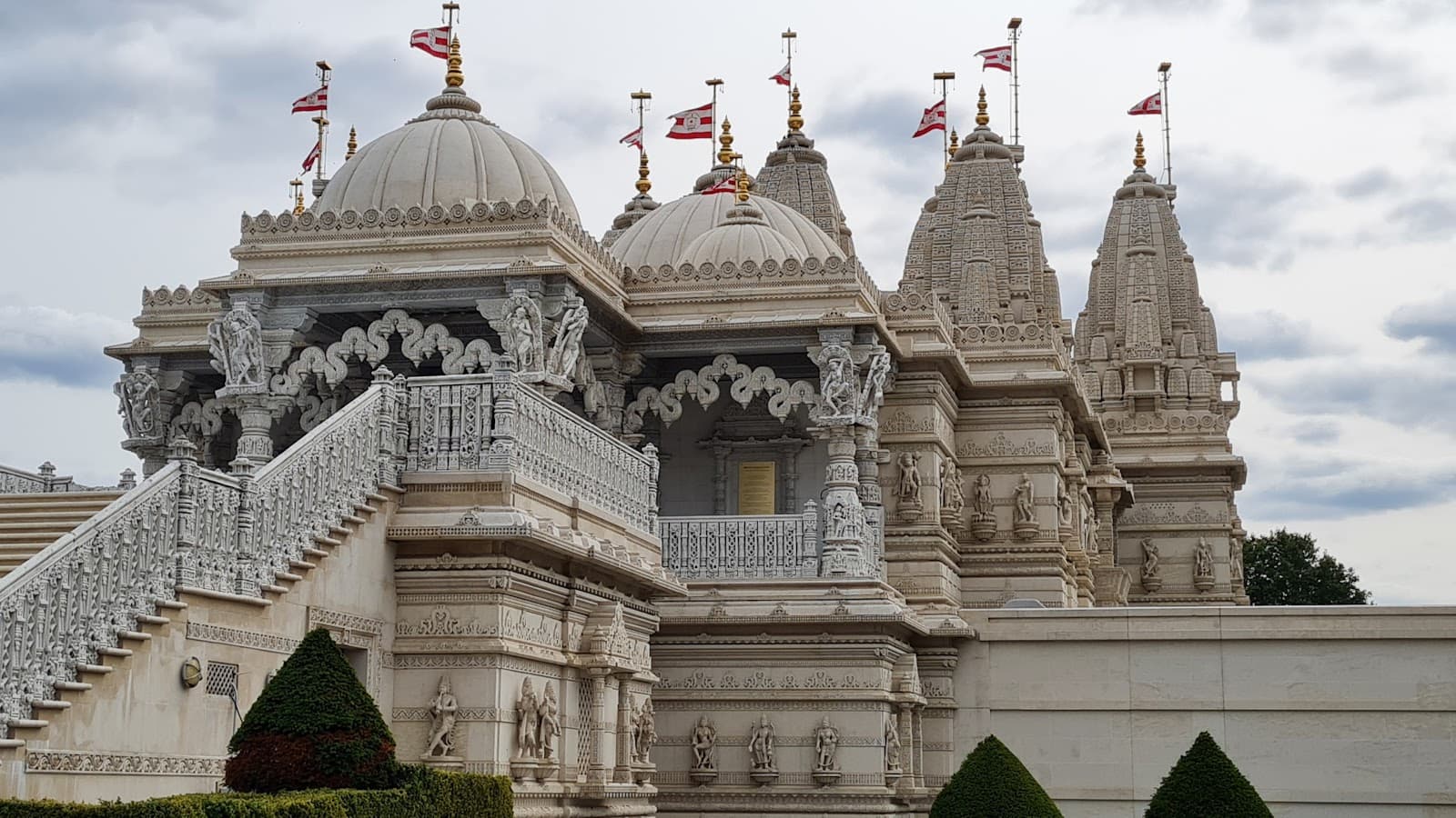 BAPS Shri Swaminarayan Mandir London temple in 105-119 Brentfield Road, Neasden, London (NW10 8LD), England, United Kingdom, England - Nagara architecture style, Maru-Gurjara architecture style, Gujarati Haveli architecture style, Indo-British architecture style (Bengal Renaissance Period) - thumbnail