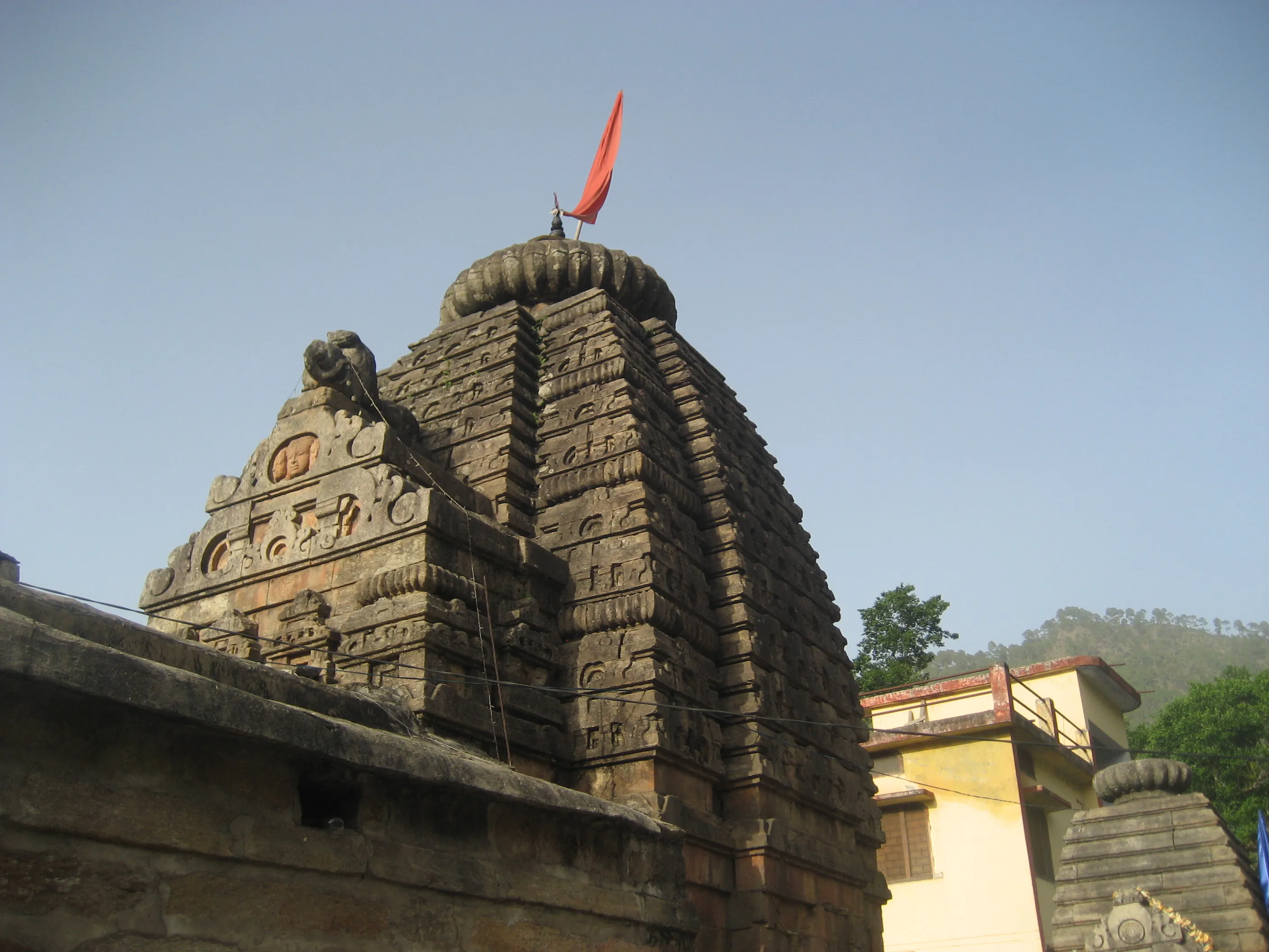 This prompt contains contradictory information. Dimapur is in Nagaland, not Rajasthan. A Rajasthani journalist wouldn't specialize in Nagaland's sites. Further, the prompt asks for a *Rajasthani* format, but for a site *outside* Rajasthan.
However, following the requested format as best as possible:
Shiv Temple Dimapur - Image 2