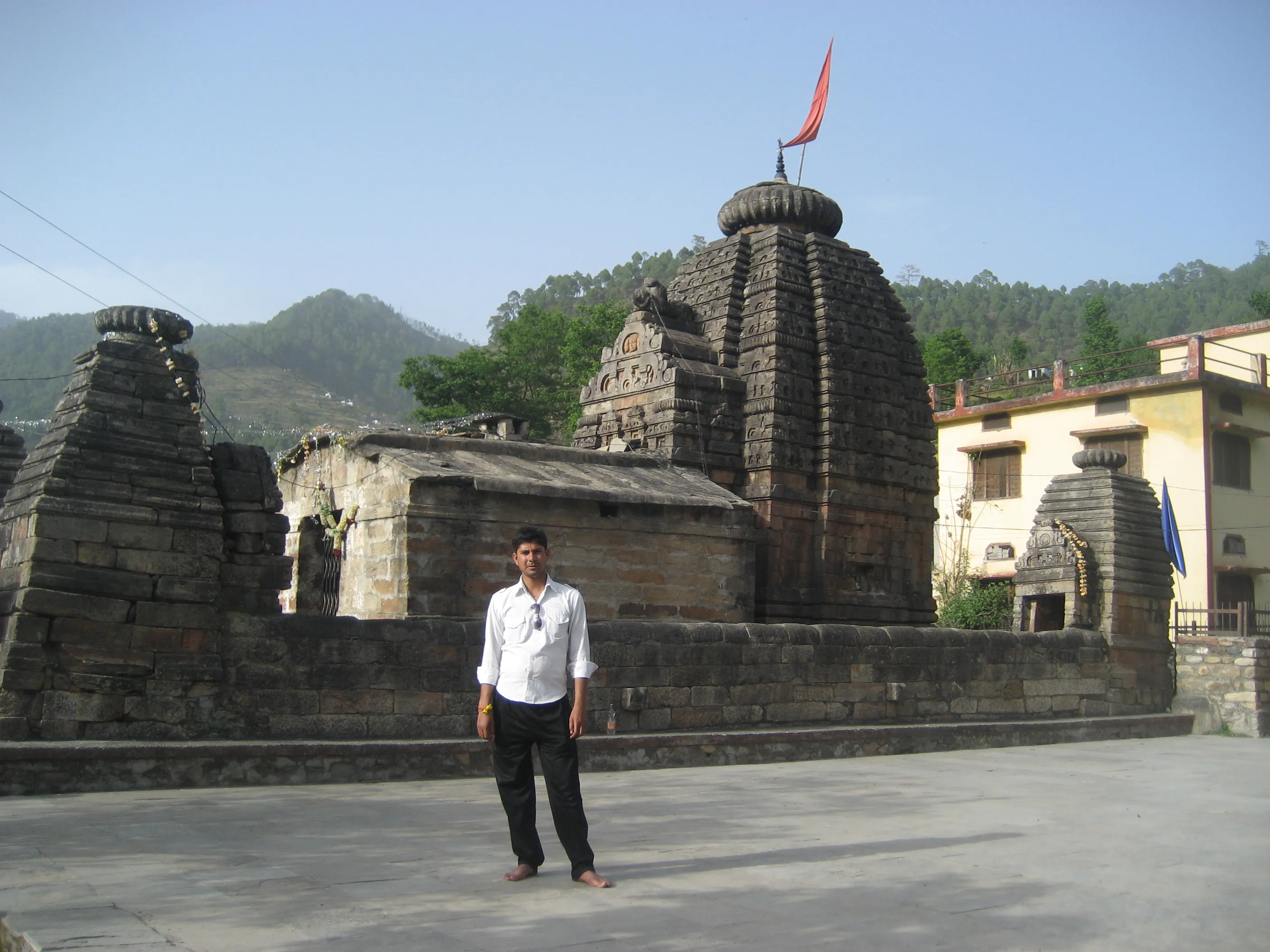 This prompt contains contradictory information. Dimapur is in Nagaland, not Rajasthan. A Rajasthani journalist wouldn't specialize in Nagaland's sites. Further, the prompt asks for a *Rajasthani* format, but for a site *outside* Rajasthan.
However, following the requested format as best as possible:
Shiv Temple Dimapur - Image 6