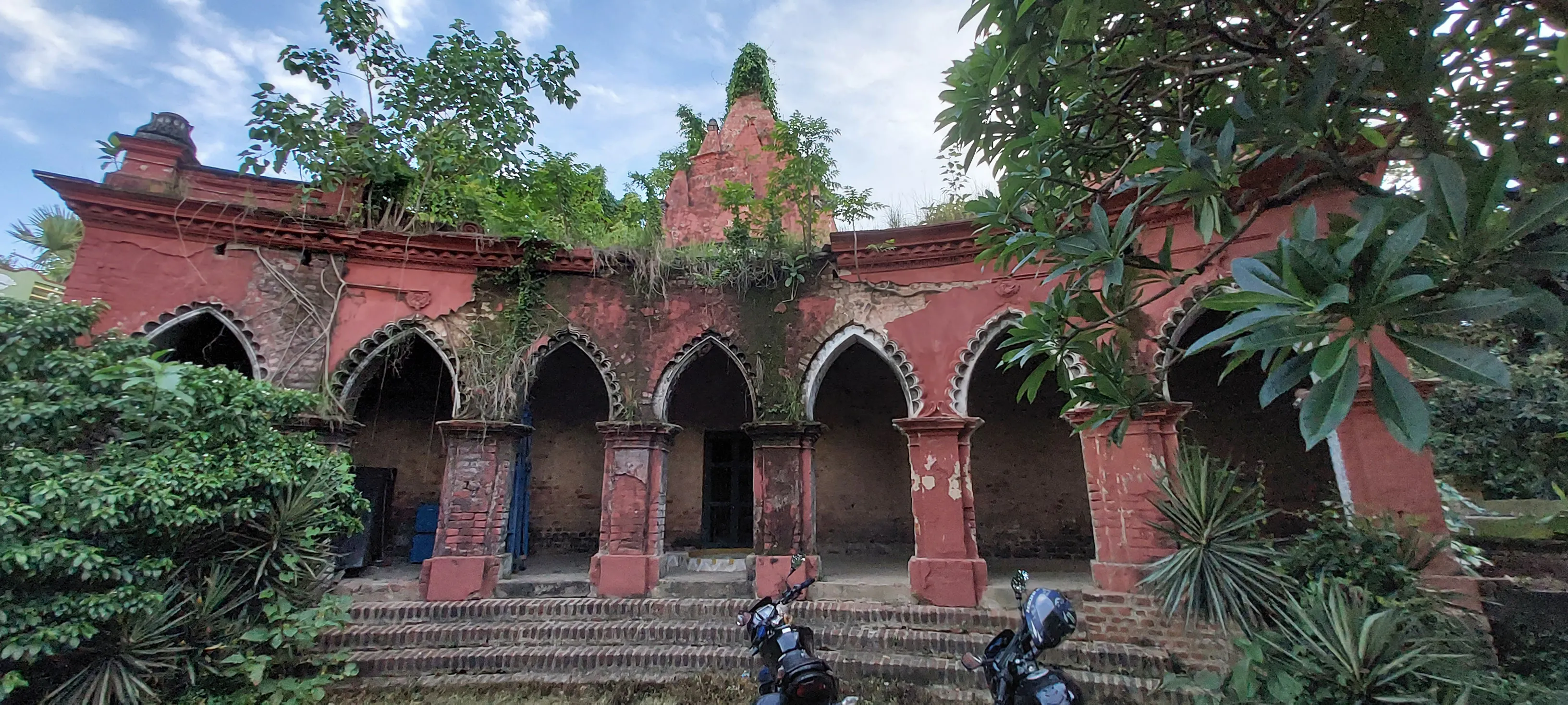 This prompt contains contradictory information. Dimapur is in Nagaland, not Rajasthan. A Rajasthani journalist wouldn't specialize in Nagaland's sites. Further, the prompt asks for a *Rajasthani* format, but for a site *outside* Rajasthan.
However, following the requested format as best as possible:
Shiv Temple Dimapur - Image 9