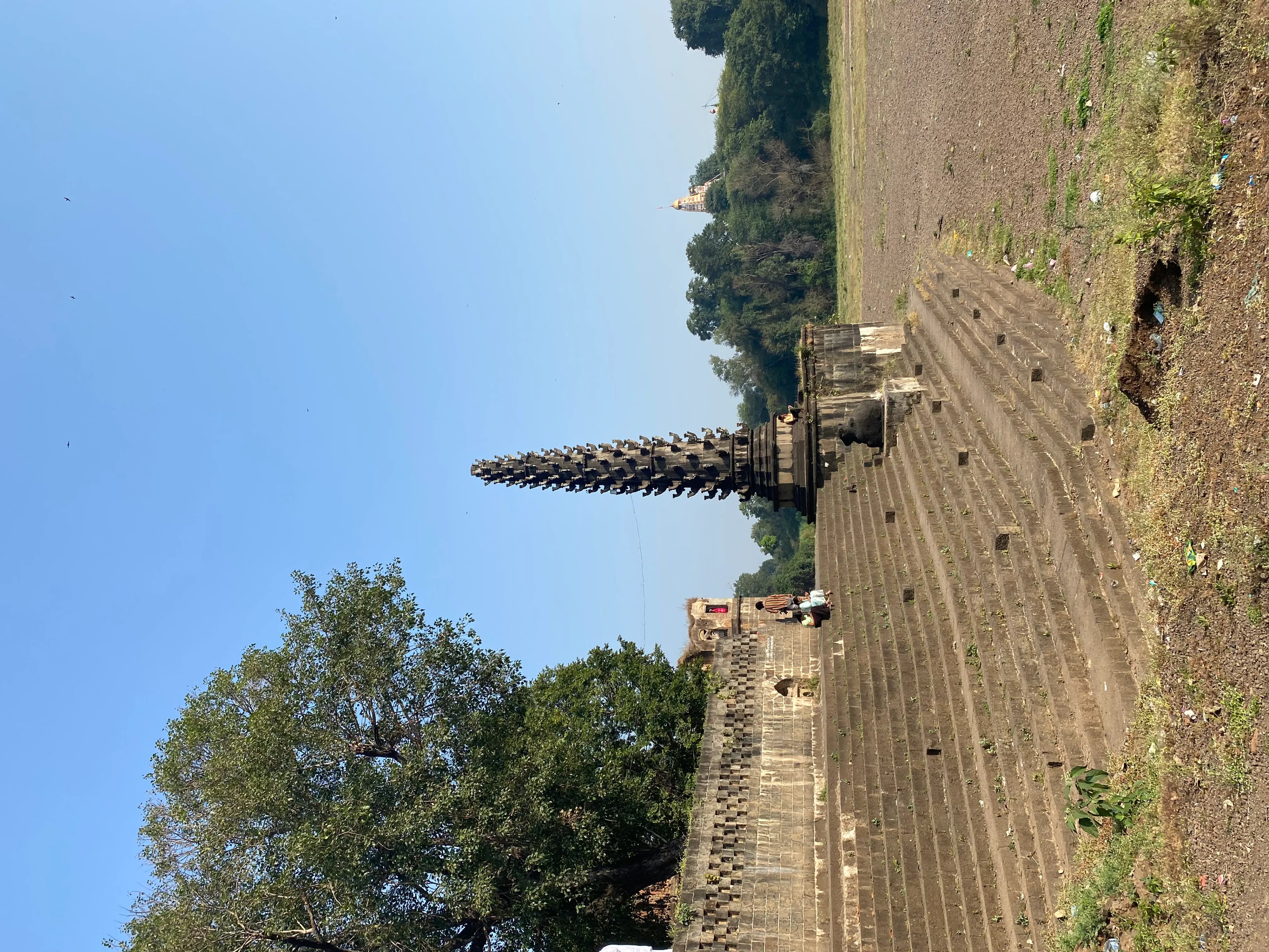 This prompt contains contradictory information. Dimapur is in Nagaland, not Rajasthan. A Rajasthani journalist wouldn't specialize in Nagaland's sites. Further, the prompt asks for a *Rajasthani* format, but for a site *outside* Rajasthan.
However, following the requested format as best as possible:
Shiv Temple Dimapur - Image 11